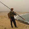 un pecheur au bord de Sidi boulfdail - Massa